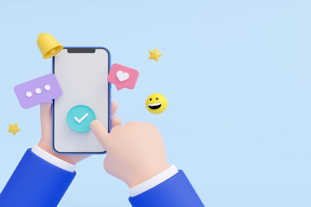 スマートフォンの画面にあるボタンを押す手